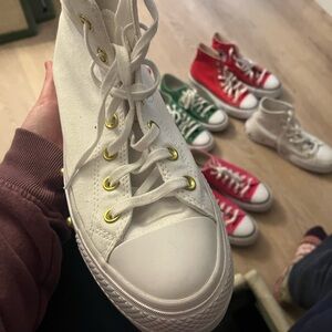 Converse White Sneakers with Gold Accents platforms